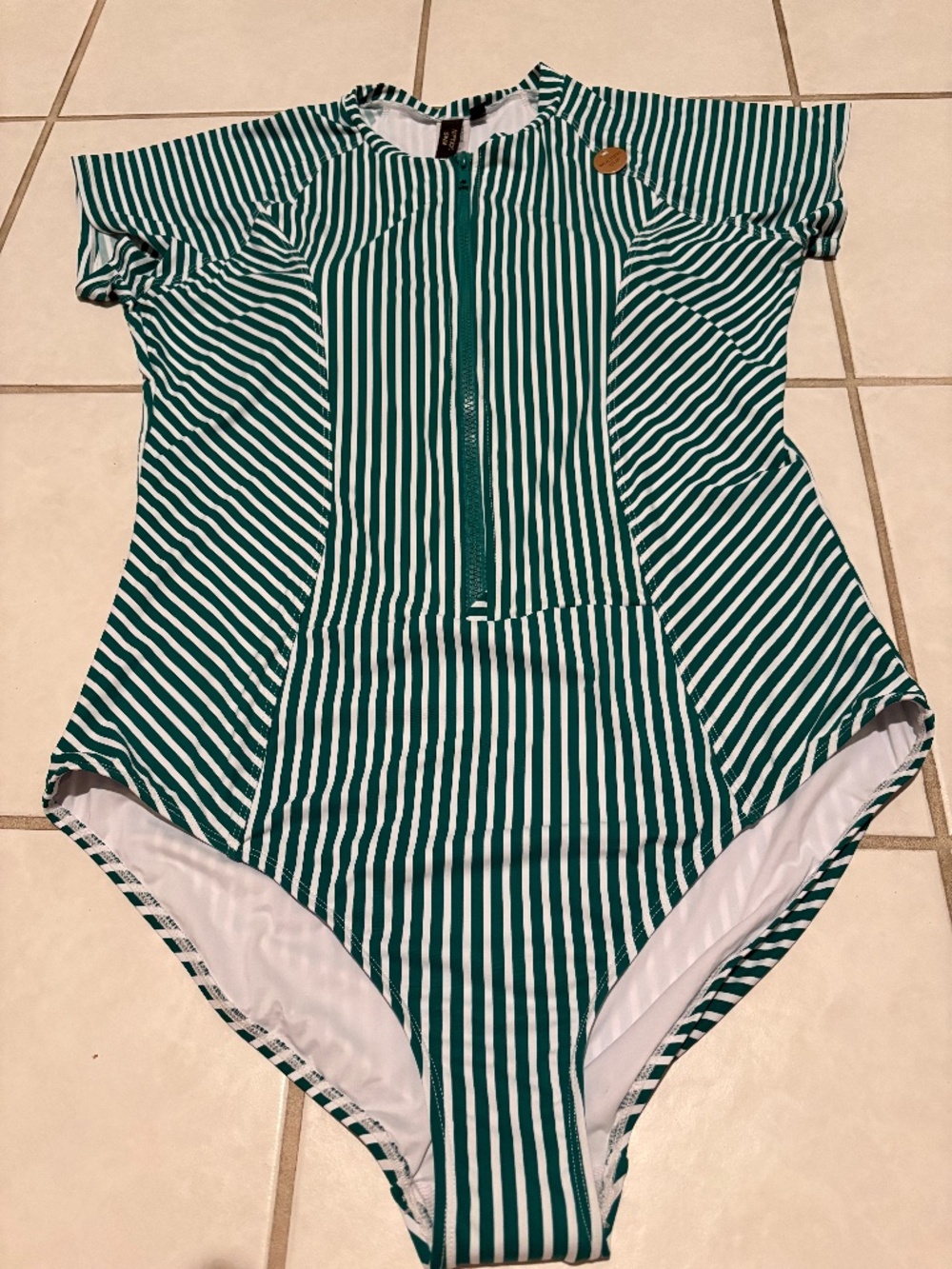 NipTuck Swim Suit